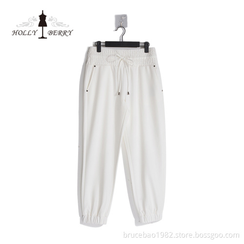 Atmungsaktive elastische Niete mit hoher Taille Lose Streetwear Weiße Damen Jogginghose Modisch